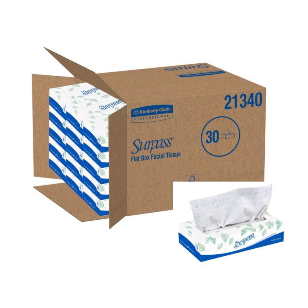 A box of SURPASS facial tissues with several tissues displayed in front of the box. The box is open, showing the tissues inside, and has branding and certification logos on it.